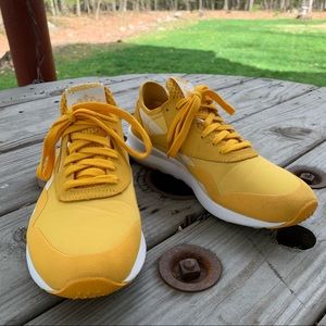 Yellow Reebok lightweight sneakers
